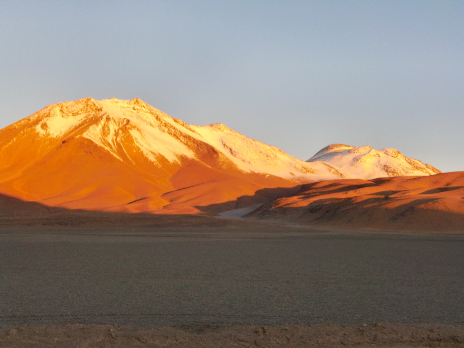 The Cerros Tres Cruzes at sunset. The highest point (6746 meters) is left (without snow)